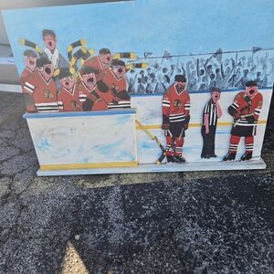 Hockey Team Art Piece with Players in Red and Black
